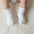 Chaussettes bébé blanches en coton doux